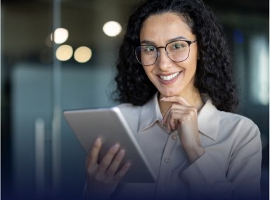 Woman Of Color Holding Tablet Satisfied