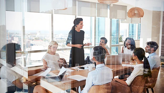 Business Woman Leads Meeting