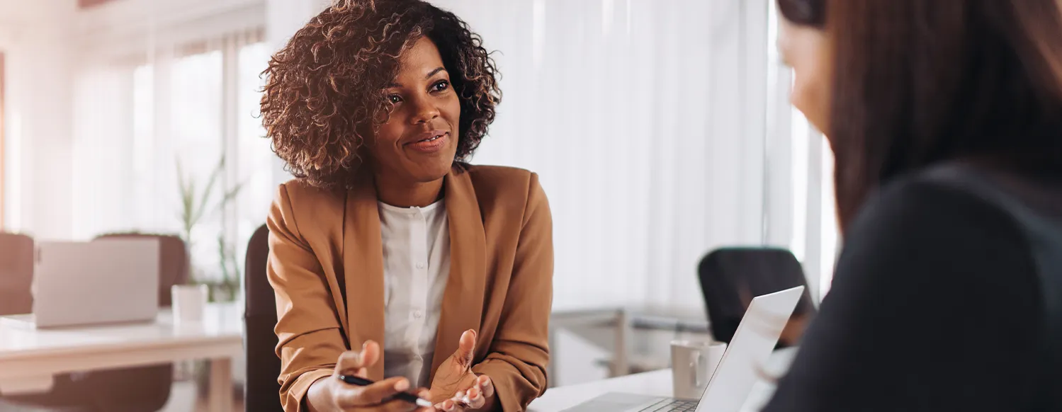 Professional African American Woman Interviewing Candidate Formal Office